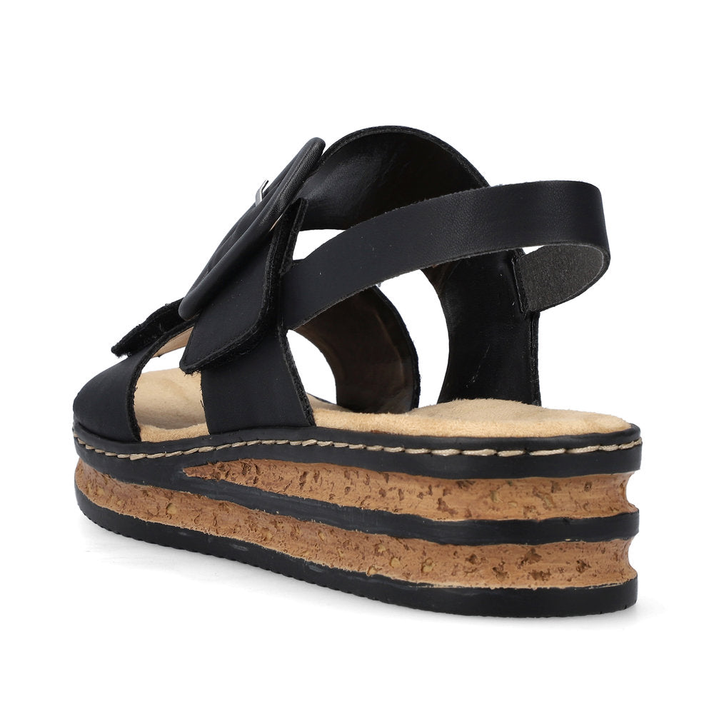 Rieker 62950 Ladies Sandals The Rieker 62950 Ladies Stylish Slingback Sandals In Black or White Have A Wedge Heel & Buckle Detail. Colours Ltd, Colours, Colours Farnham, Colours Shoes