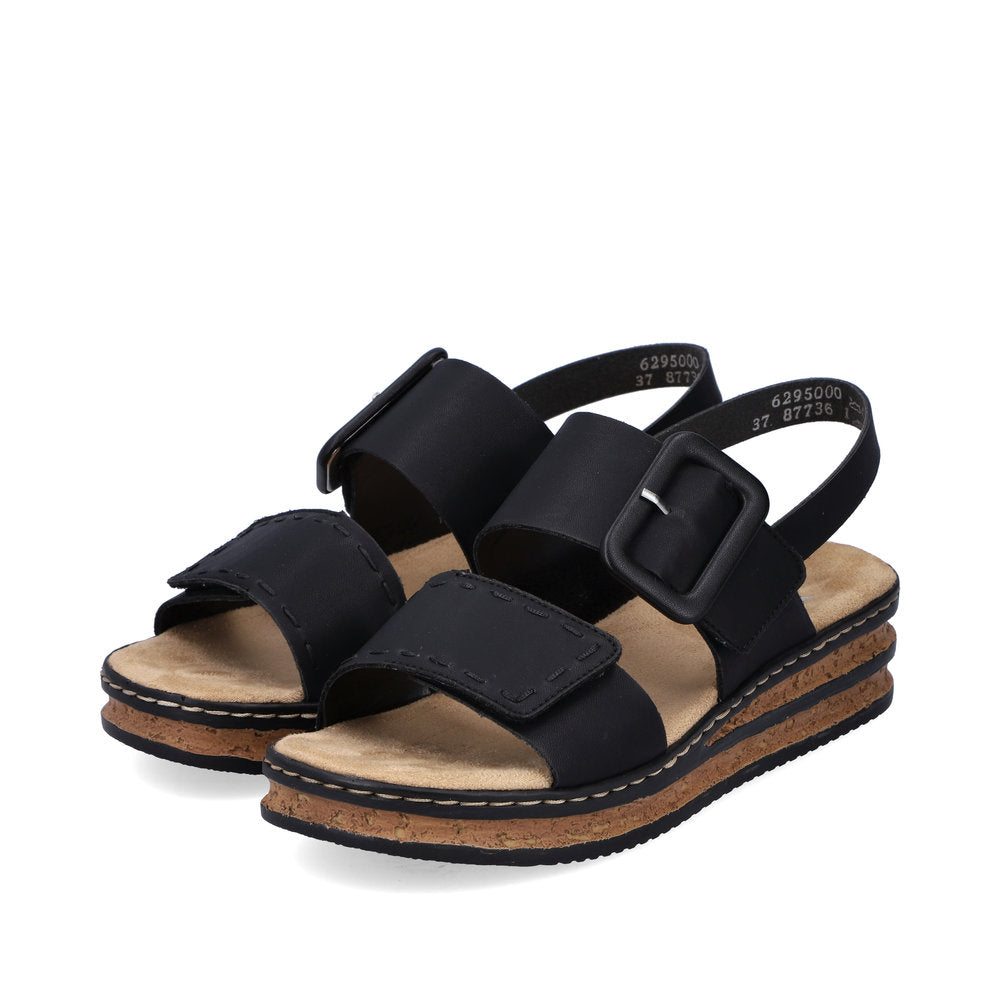 Rieker 62950 Ladies Sandals The Rieker 62950 Ladies Stylish Slingback Sandals In Black or White Have A Wedge Heel & Buckle Detail. Colours Ltd, Colours, Colours Farnham, Colours Shoes