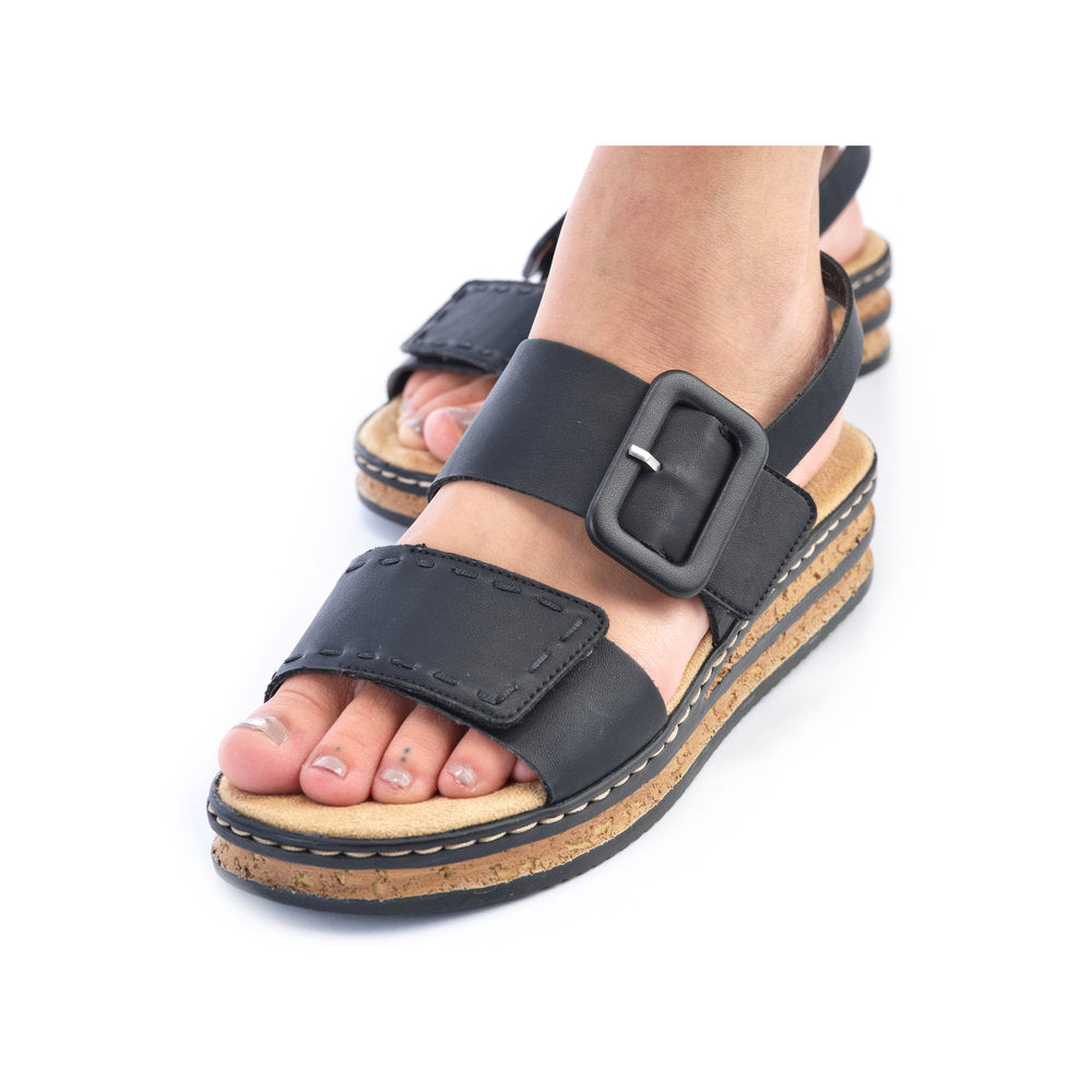 Rieker 62950 Ladies Sandals The Rieker 62950 Ladies Stylish Slingback Sandals In Black or White Have A Wedge Heel & Buckle Detail. Colours Ltd, Colours, Colours Farnham, Colours Shoes