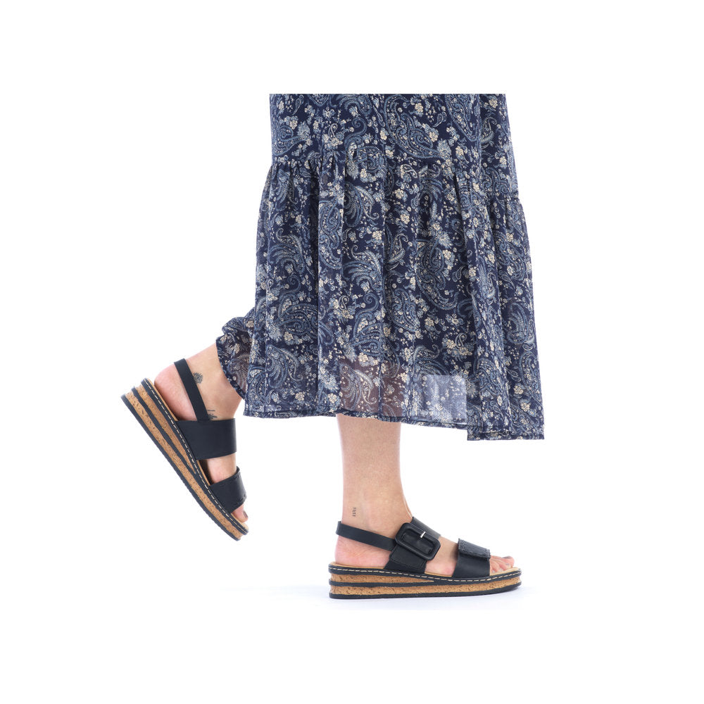 Rieker 62950 Ladies Sandals The Rieker 62950 Ladies Stylish Slingback Sandals In Black or White Have A Wedge Heel & Buckle Detail. Colours Ltd, Colours, Colours Farnham, Colours Shoes