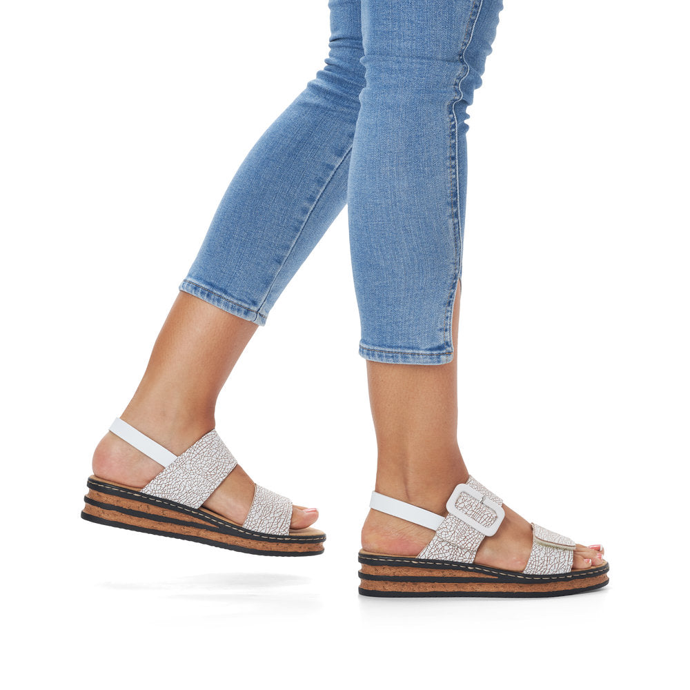 Rieker 62950 Ladies Sandals The Rieker 62950 Ladies Stylish Slingback Sandals In Black or White Have A Wedge Heel & Buckle Detail. Colours Ltd, Colours, Colours Farnham, Colours Shoes