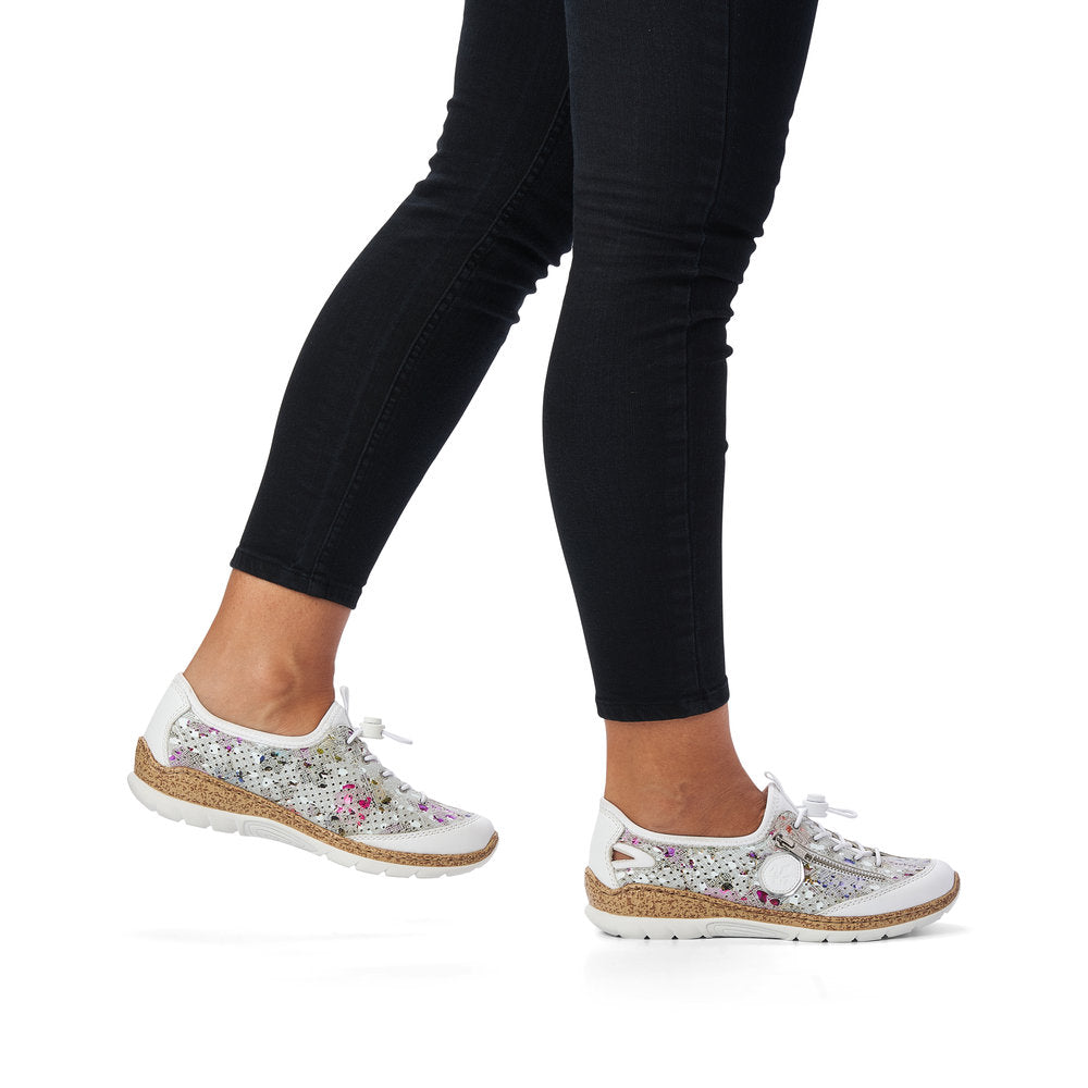 Rieker N42V1-90 Ladies Slip-on Trainers Upper Material: Synthetic Lining Material: Synthetic Sole: PU Closure: Elasticated Laces Features: Comfort, Easy On/Off Heel Type: Flat Technology: Rieker Antistress, Lightweight, Memory Cushioned Footbed Toe Shape: Round Width: Regular Colours Ltd, Colours, Colours Farnham, Colours Shoes
