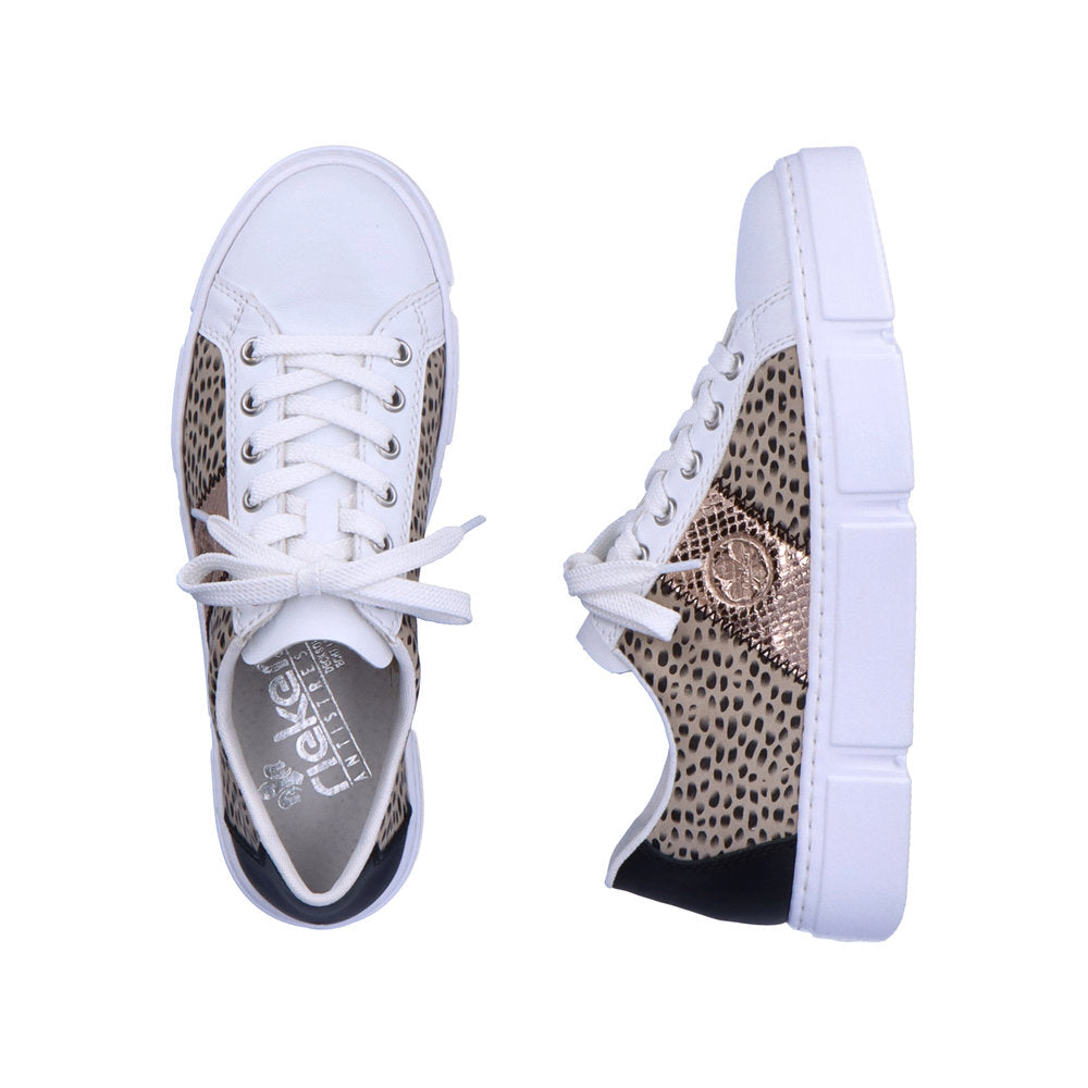 Rieker N5910-90 Ladies Trainers Fabulous white, flat lace-up trainers with fashionable print and rose-gold side detail from Rieker. Colour: White / Multi Round toe shape Lace-up closure Soft textile lining Comfortable leather footbed Upper: Synthetic Lining & Sock: Leather/Textile Outer Sole: Other Material Colours Ltd, Colours, Colours Farnham, Colours Shoes