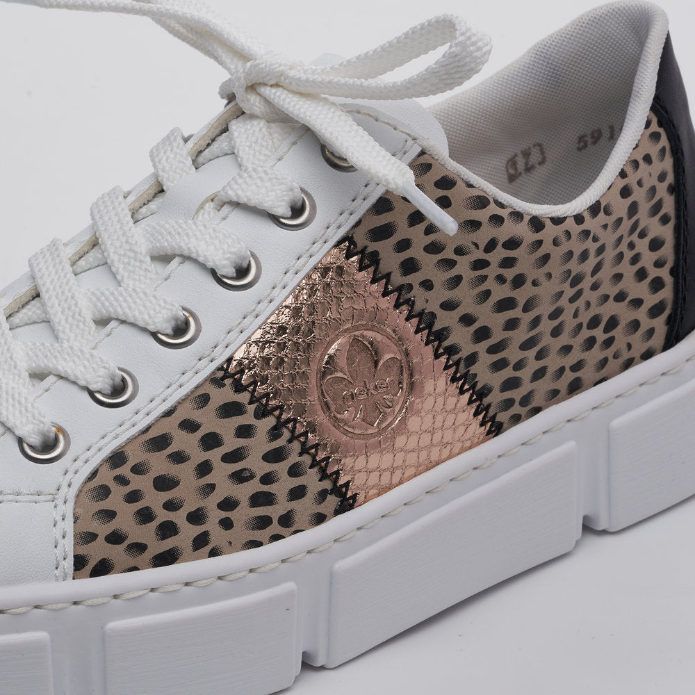 Rieker N5910-90 Ladies Trainers Fabulous white, flat lace-up trainers with fashionable print and rose-gold side detail from Rieker. Colour: White / Multi Round toe shape Lace-up closure Soft textile lining Comfortable leather footbed Upper: Synthetic Lining & Sock: Leather/Textile Outer Sole: Other Material Colours Ltd, Colours, Colours Farnham, Colours Shoes