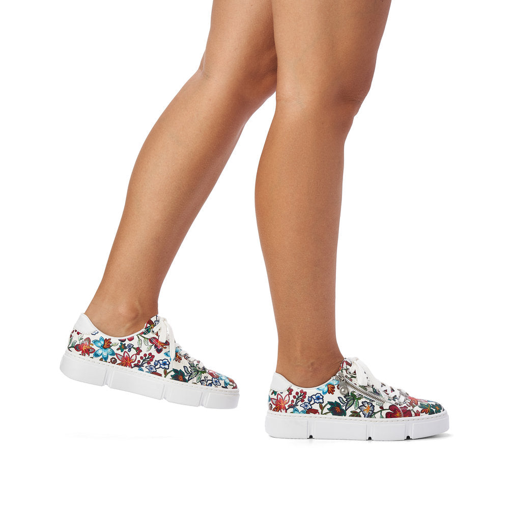 Rieker N59L1-90 Ladies Trainers Beautiful flower patterned sneakers made of synthetic material. Synthetic material upper Laces and a zipper on the top Textile lining Removable leather insole Antistress -sole is flexible and cushions the step Thick sole Colours Ltd, Colours, Colours Farnham Colours Shoes